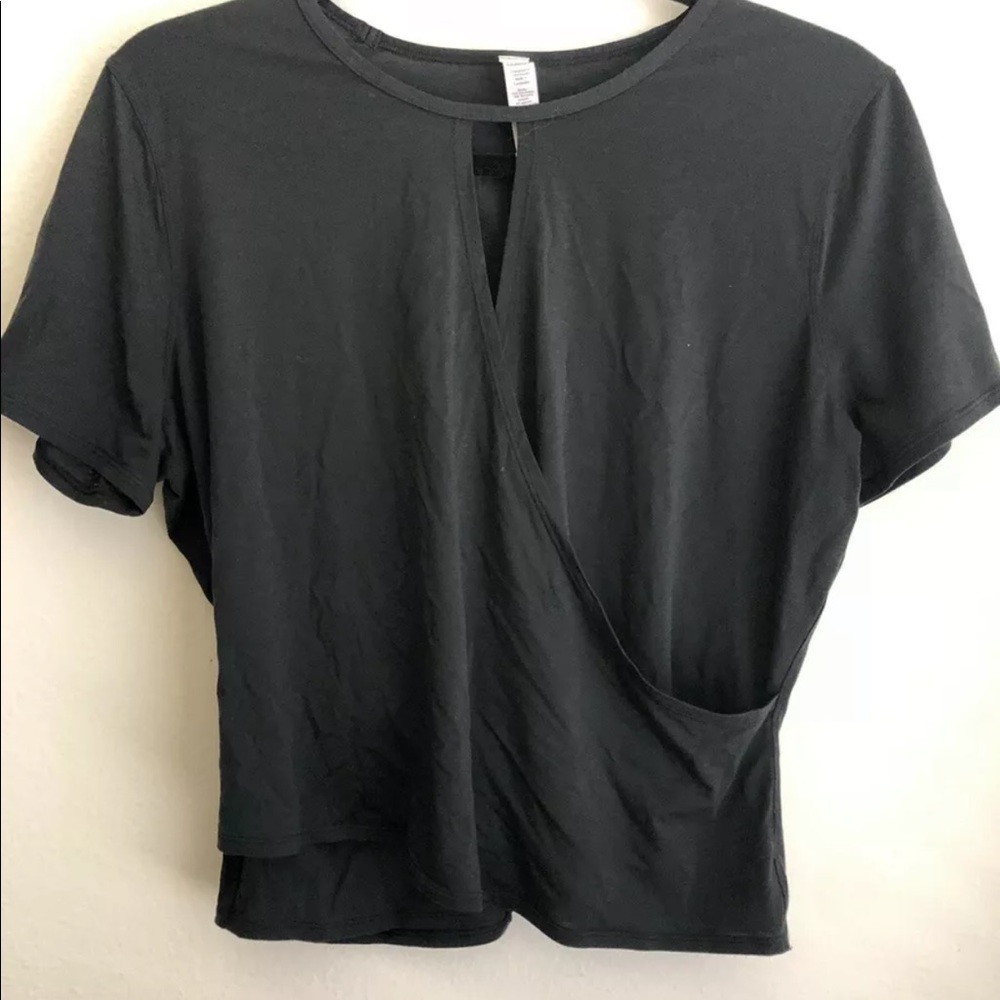 Lululemon top, Black ,Size 12, Round Trip, Short Sleeve Top, Great Condition